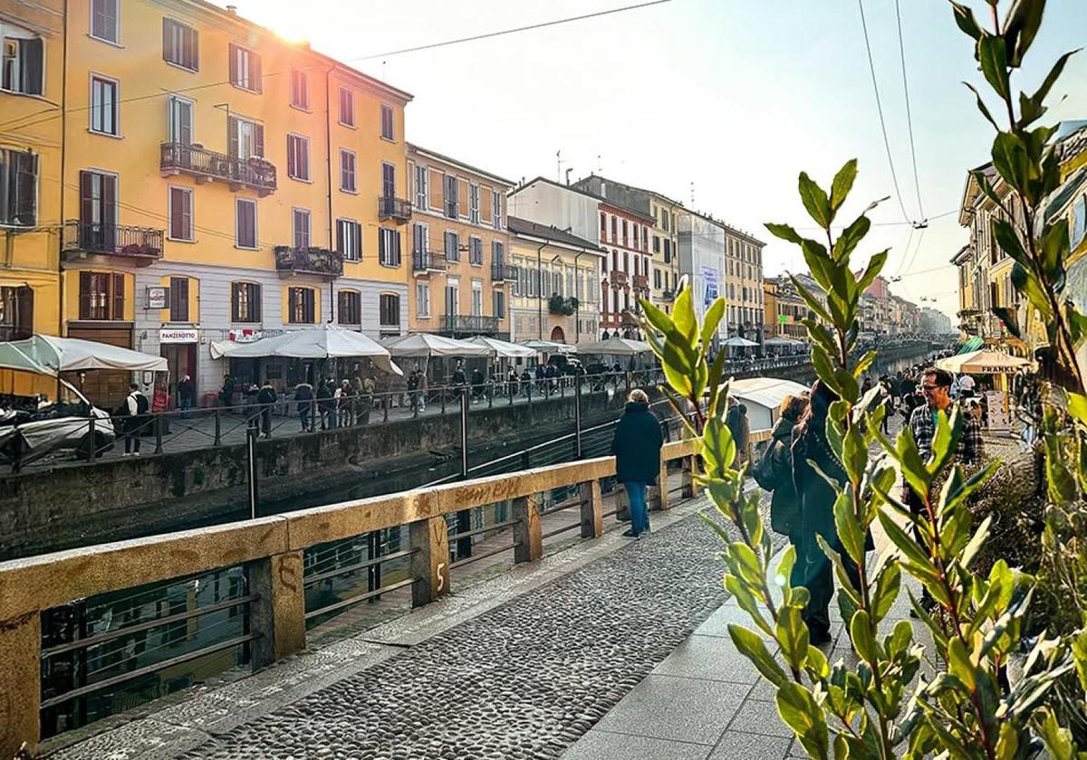View of Milan’s Navigli canal lined with colorful buildings